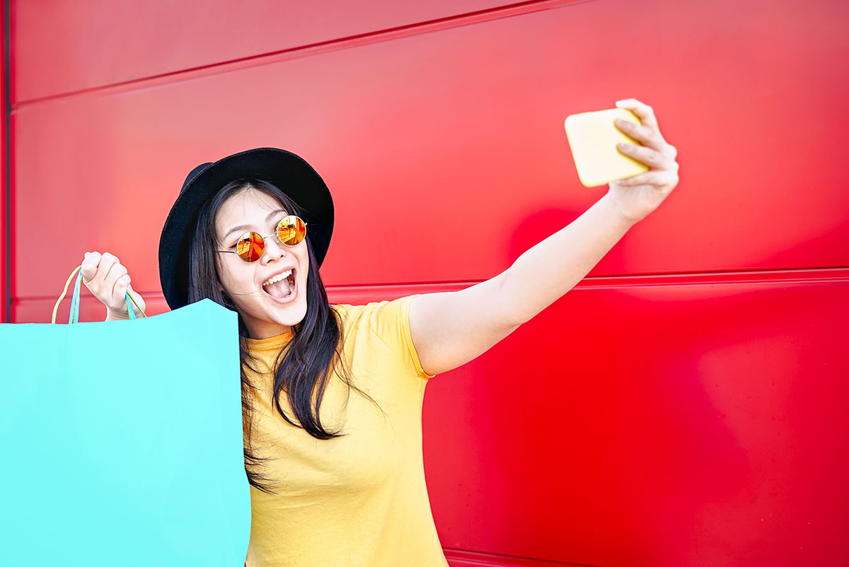 Fashionable Generation Z shopper takes a selfie