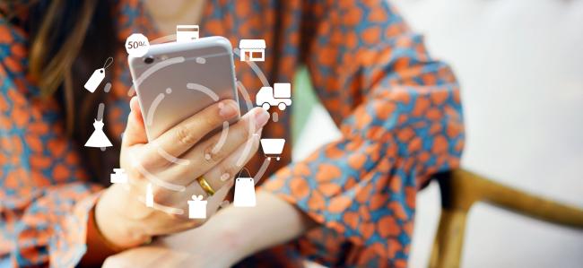 Demand, Data and Deeper Partnerships in the New Supply Chain Female shopper on smartphone with shipping, logistics icons
