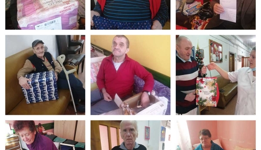 Residents open gifts from CGS Romania staff