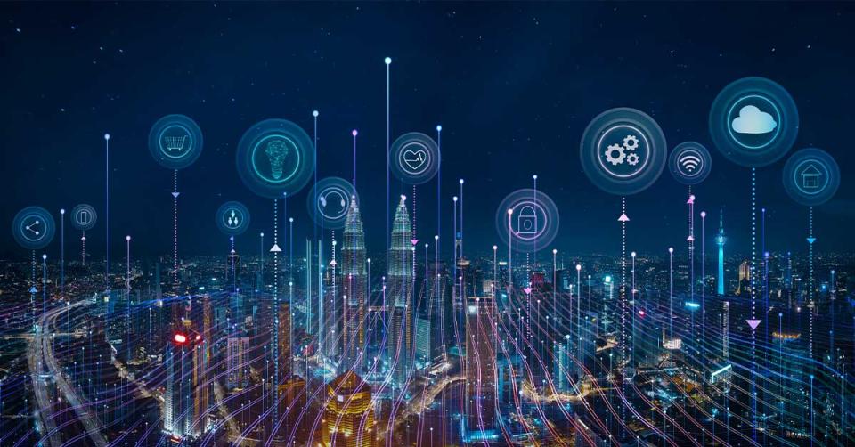 IT Services for Modern Businesses City lights at night with technology services highlighted