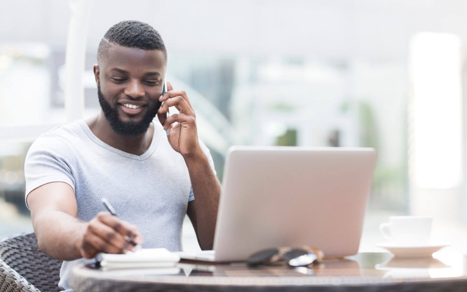 CEO browsing the web for an outsourcing company while undergoing a sales call with an outsourcing company